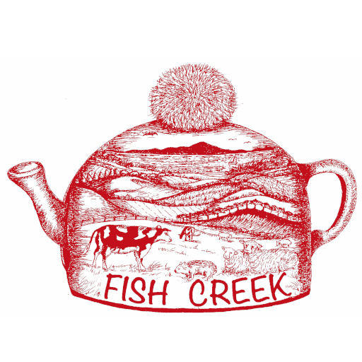 Illustration of a teapot with a pom-pom on top, featuring a scenic landscape with cows, and the text 'FISH CREEK' at the base. The Festival is grateful to Cheryl Bradshaw for the artwork.